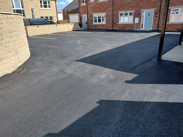 Tarmac parking court on a Harrogate residential development